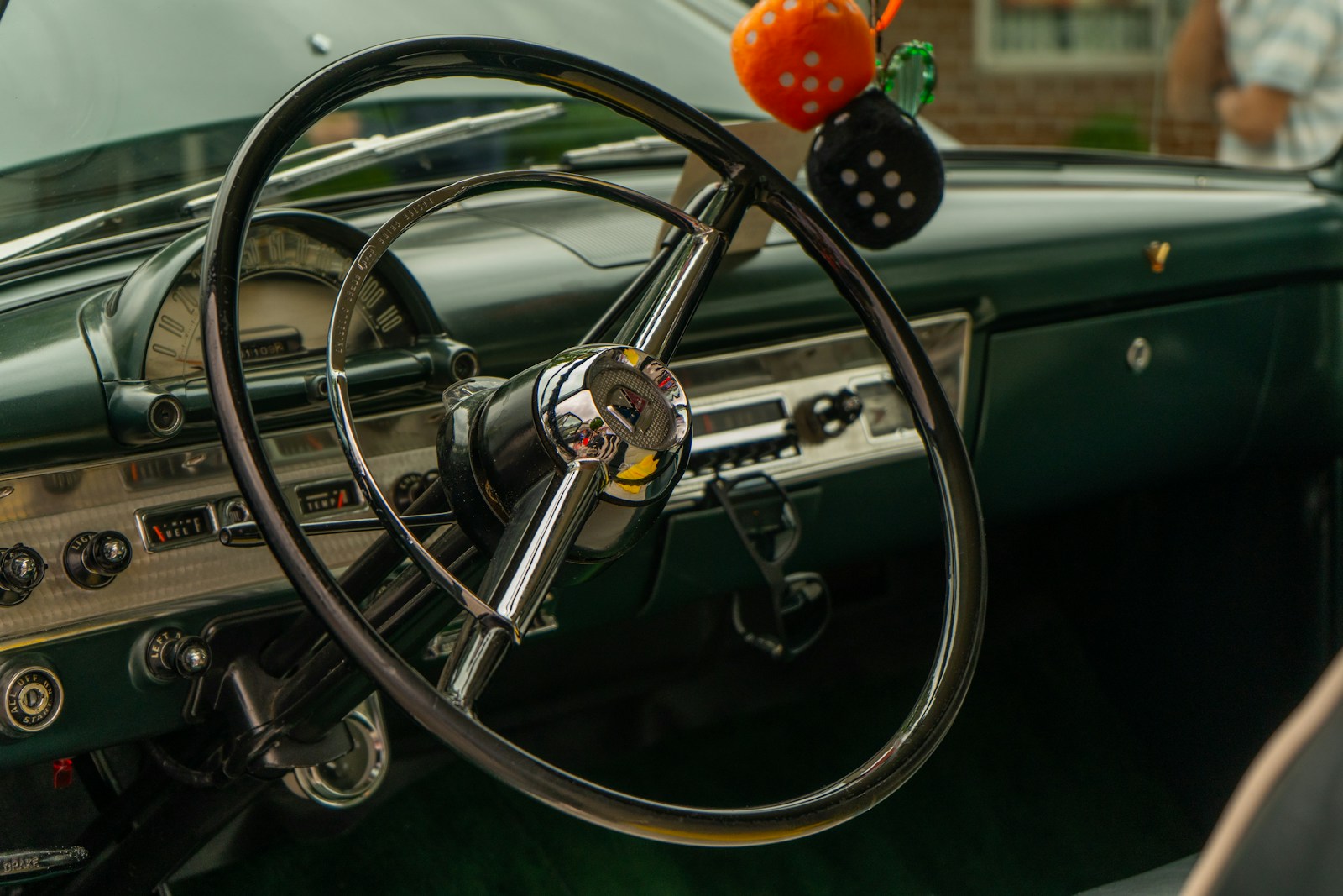 Photo by Taylor Mortin a steering wheel and dashboard of a car